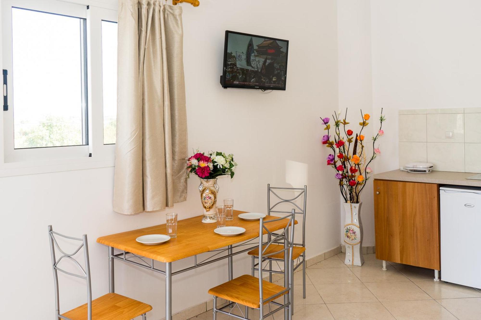 Laganas Strip Mall Apartments Bagian luar foto